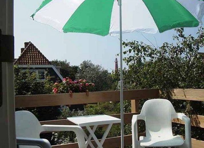 Gezellige woonkamer van Vakantiehuis Scheirmonnikoog in Schiermonnikoog, Waddeneilanden.