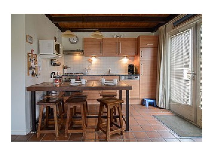 Gezellige woonkamer van Vakantiehuis Scheirmonnikoog in Schiermonnikoog, Waddeneilanden.