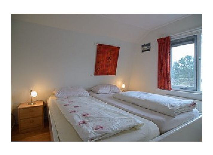 Gezellige woonkamer van Vakantiehuis Scheirmonnikoog in Schiermonnikoog, Waddeneilanden.