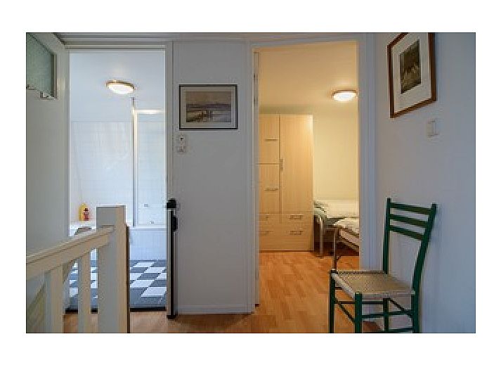 Gezellige woonkamer van Vakantiehuis Scheirmonnikoog in Schiermonnikoog, Waddeneilanden.