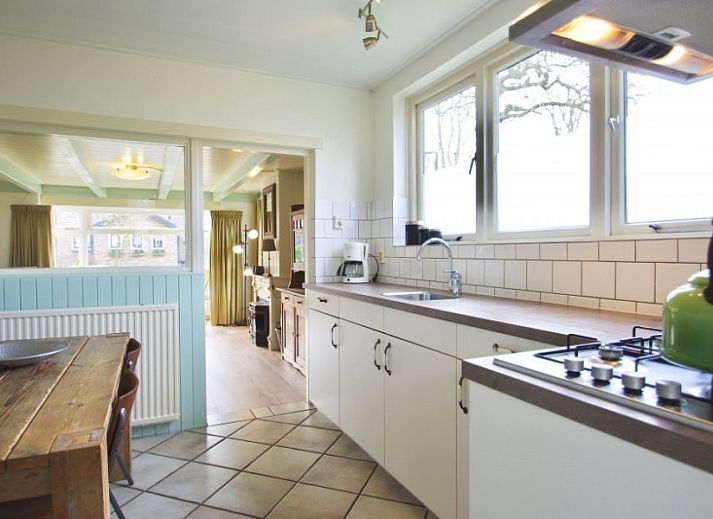 Klaver Vier vakantiehuis in Schiermonnikoog, omgeven door groen en rust op de Waddeneilanden.