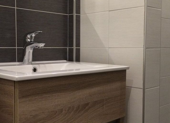 Cozy living room of Louwtjesduin Oost vacation home on Schiermonnikoog.