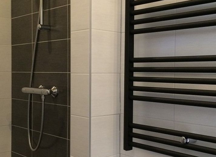 Cozy living room of Louwtjesduin Oost vacation home on Schiermonnikoog.