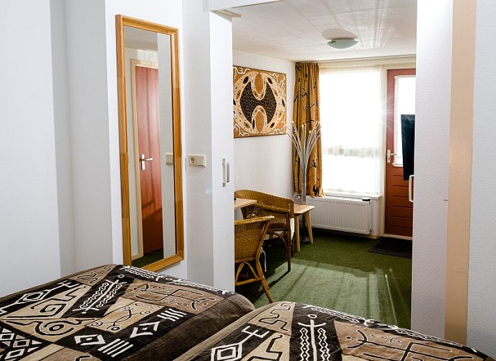 Vorderansicht der Pension Westerburen, ein charmantes B&B auf dem Schiermonnikoog, ideal fuer einen entspannten Aufenthalt.