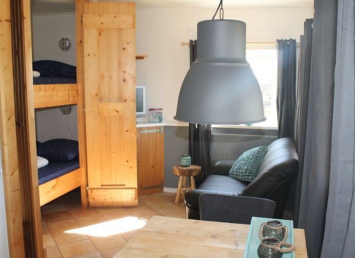 Sterre appartement in Schiermonnikoog met charmant terras, gelegen op de Waddeneilanden, biedt een ontspannen verblijf in een natuurlijke omgeving.