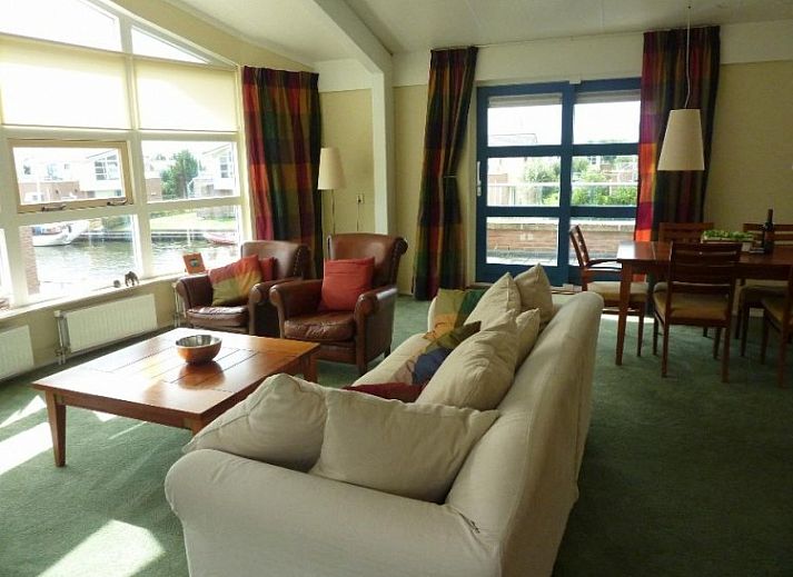 Aerial view of Workum and the IJsselmeer, showing Watervilla Noorderbries type Lisdodde in the Frisian Lakes.