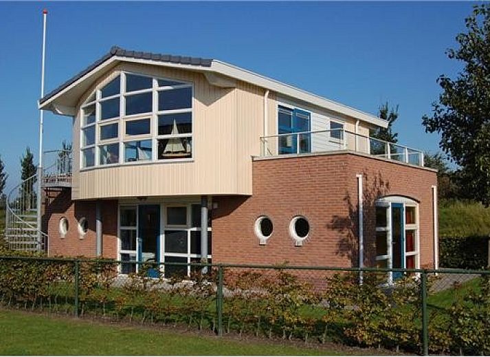 Aerial view of Workum and the IJsselmeer, showing Watervilla Noorderbries type Lisdodde in the Frisian Lakes.
