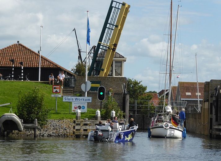 Aerial view of Workum and the IJsselmeer, showing Watervilla Noorderbries type Lisdodde in the Frisian Lakes.
