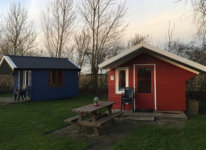 Gemuetliches Ferienhaus in Workum, Ferienhaus am IJsselmeer mit charmanten Holzhaeuschen und gruenem Garten fuer einen entspannten Aufenthalt.