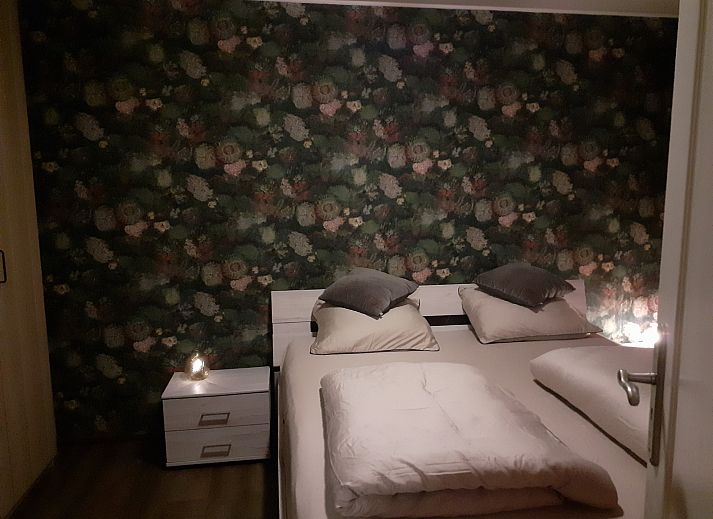 Schlafzimmer in FR452 Ferienhaus in Lemmer mit warmer Einrichtung, in der Naehe des IJsselmeers.