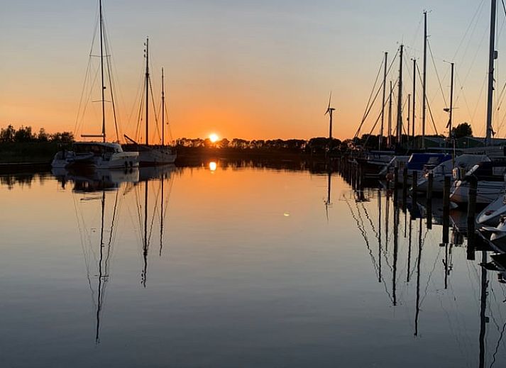 Comfortabele slaapkamer in Vakantiehuis in Warns, perfect voor ontspanning aan het IJsselmeer.