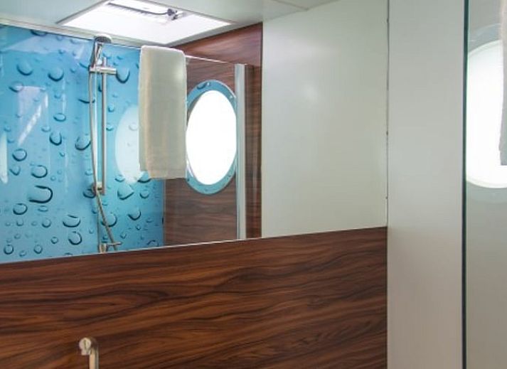 Comfortabele slaapkamer in Vakantiehuis in Warns, perfect voor ontspanning aan het IJsselmeer.