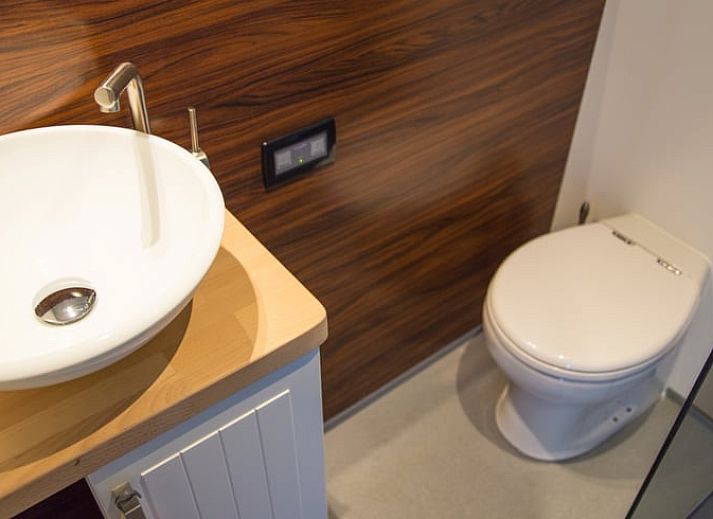 Comfortabele slaapkamer in Vakantiehuis in Warns, perfect voor ontspanning aan het IJsselmeer.