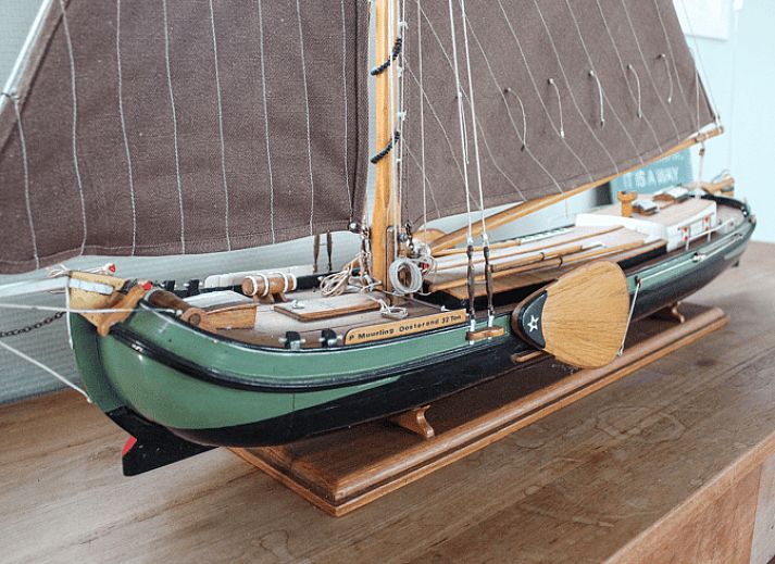 Stylish dining area in Holiday Home in Oudega, located on Lake Heeg in the Frisian Lakes, with modern decor and cozy atmosphere.