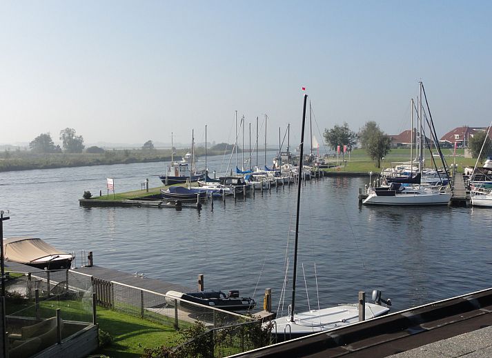 Vacation home FR518 in Koudum overlooking Fluessen and Frisian lakes.