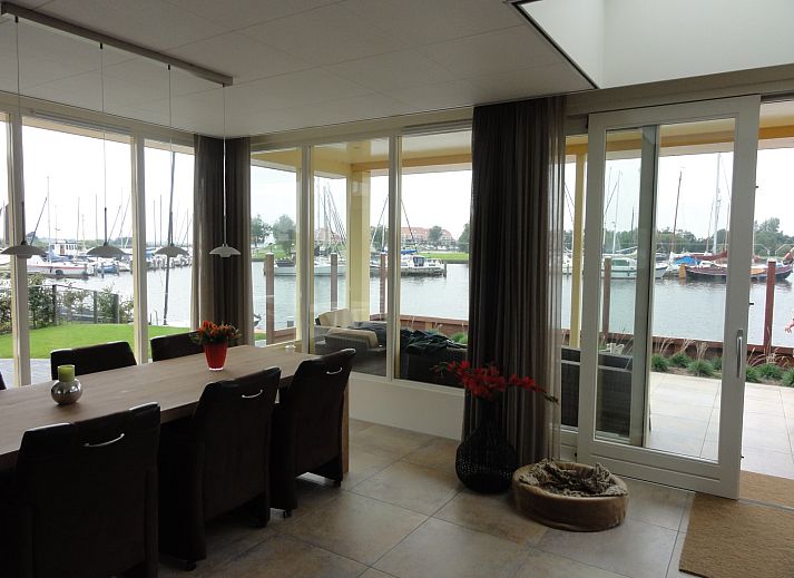 Marina near vacation home FR518 in Koudum, with boats and serene surroundings.