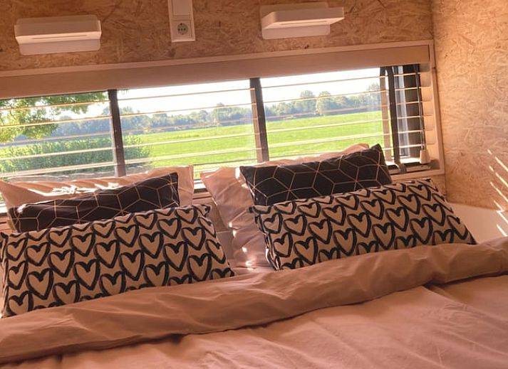 Vacation home in Koudum, an idyllic stay in the Frisian lakes with a beautiful view of the green surroundings.