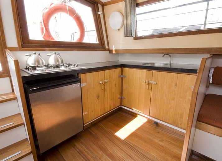 Historic Tjalk Wantij in Gaastmeer, ideal for a vacation on the Frisian lakes.