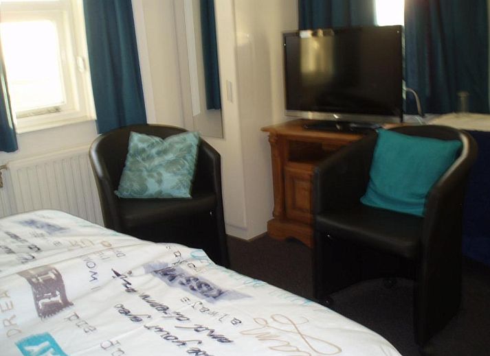 Comfortable bedroom in B&B Fam. Tavenier, Vrouwenpolder, Walcheren, ideal for a relaxing stay.