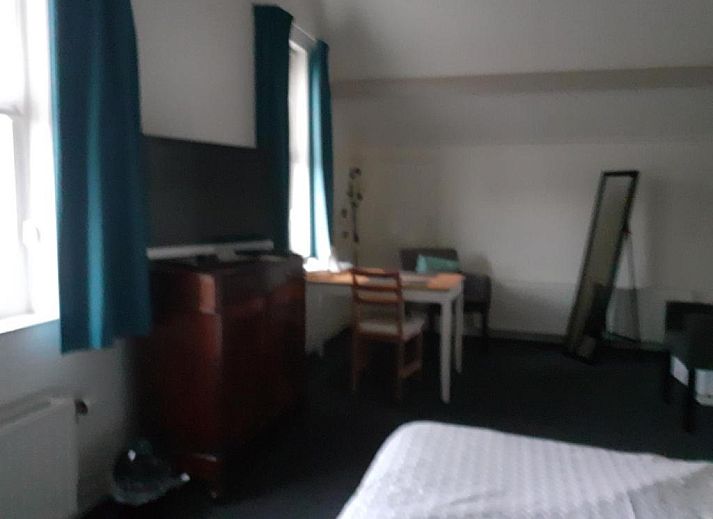 Cozy dining area in B&B Fam. Tavenier, Vrouwenpolder, Walcheren, where guests can enjoy breakfast.