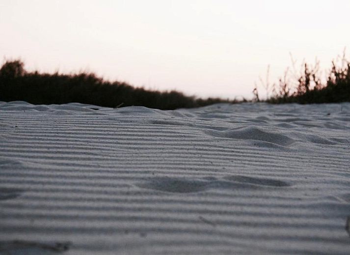 Extensive breakfast at Bed & Breakfast Zeeland, Noordwelle, with fresh fruit and rolls.