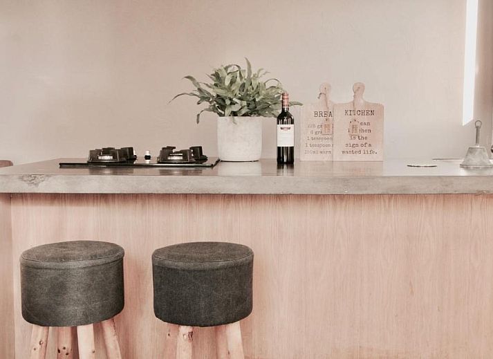 Extensive breakfast at Bed & Breakfast Zeeland, Noordwelle, with fresh fruit and rolls.