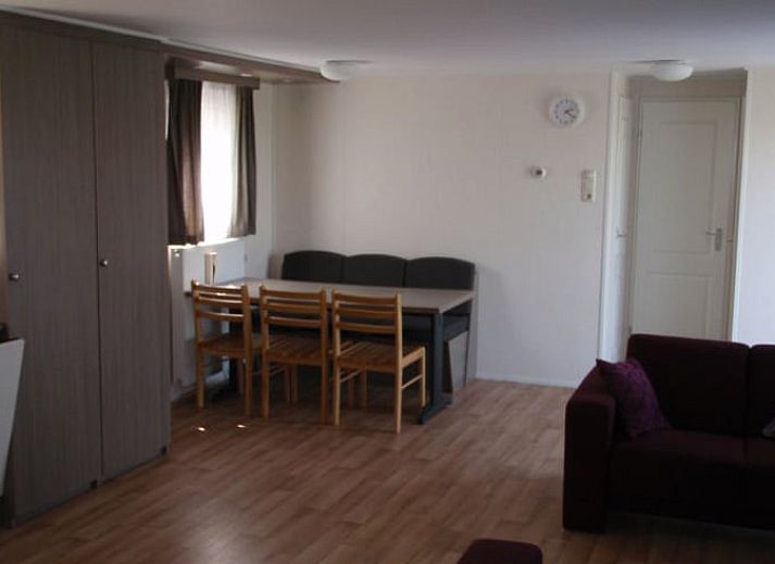 Veranda of Cottage in Terherne overlooking green fields, located in Sneekermeer, Frisian lakes.