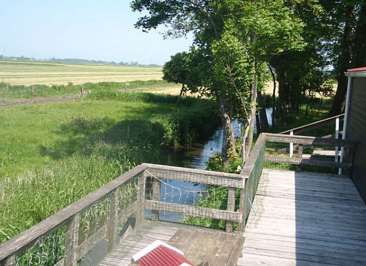 Indoor area of Cottage in Terherne with terrace view, vacation home in Terherne, Sneekermeer.