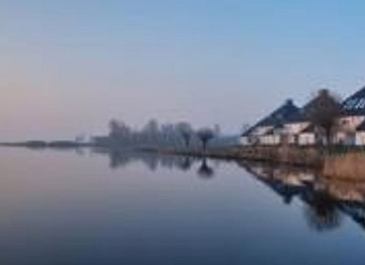 Marina at Holiday home in Offingawier, perfect location on Sneekermeer for water sports enthusiasts.