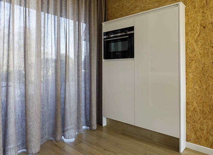 Luchtfoto van vakantiehuis FR403 in Earnewald, gelegen aan de Friese meren met prachtig uitzicht op de omgeving.