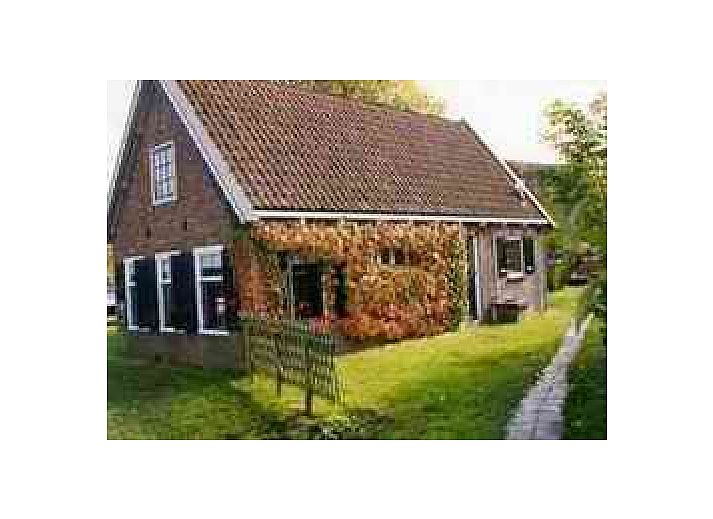 Es alde hs Ferienhaus in Wartena, an den friesischen Seen, mit grnem Garten und schner Aussicht auf die Natur.