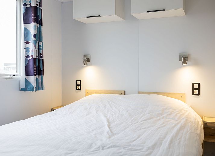 Vakantiehuis Natuurlijk de Veenhoop terras met uitzicht op groen in De Veenhoop, Friese meren.