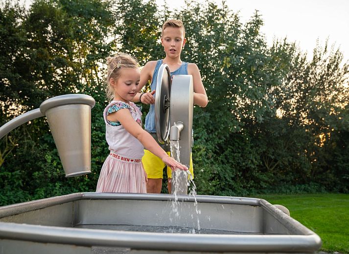 Esonstad Basis camping site C1 in Anjum, view over green fields and nearby Lauwersmeer.