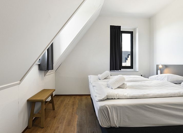 Plattegrond van Esonstad 6-persoons maisonnette in Anjum, Lauwersmeer. Ruime indeling met slaapkamers en badkamer, ideaal voor een ontspannen verblijf.