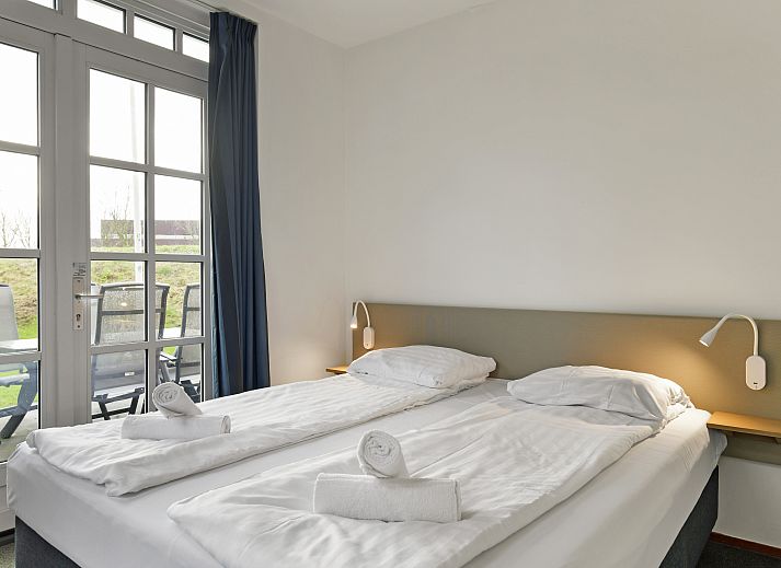 Esonstad 12-persoons woning in Anjum, Lauwersmeer, traditioneel vakantiehuis met karakteristieke gevels nabij de Friese meren.