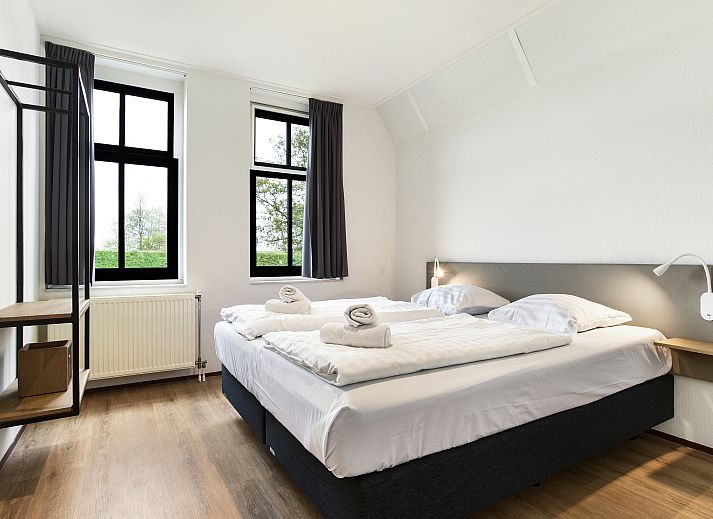 Plattegrond van Esonstad 6-persoons woning 6D2 in Anjum, Lauwersmeer. Ruime indeling met meerdere slaapkamers en badkamer.
