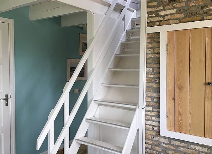 Gemuetliches Wohnzimmer mit Holzofen in Cottage in Kollumerpomp, Ferienhaus in Lauwersmeer.