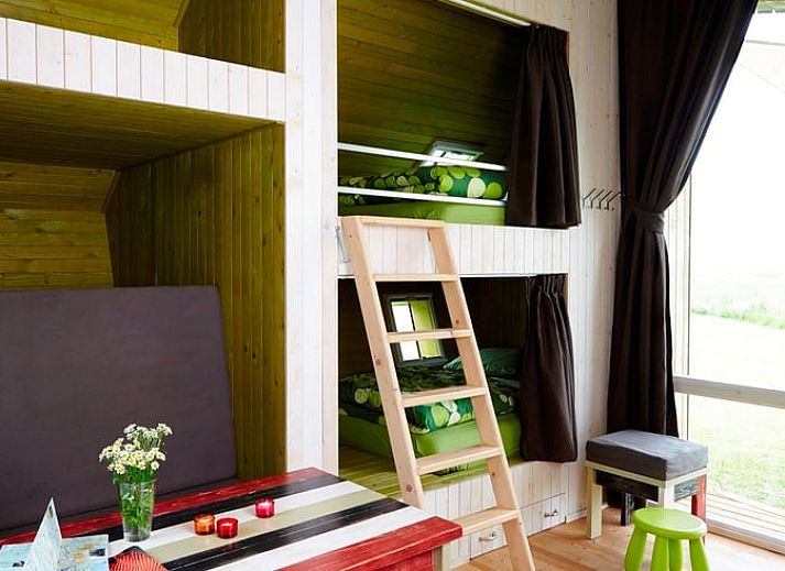 Cottage in Kollumerpomp cottage with modern wooden architecture in the green Lauwersmeer, Frisian lakes.