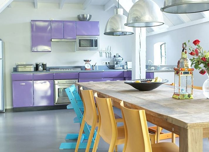 Vacation home in Kollumerpomp, located in the green nature of Lauwersmeer, offers a charming exterior with traditional Frisian architecture.