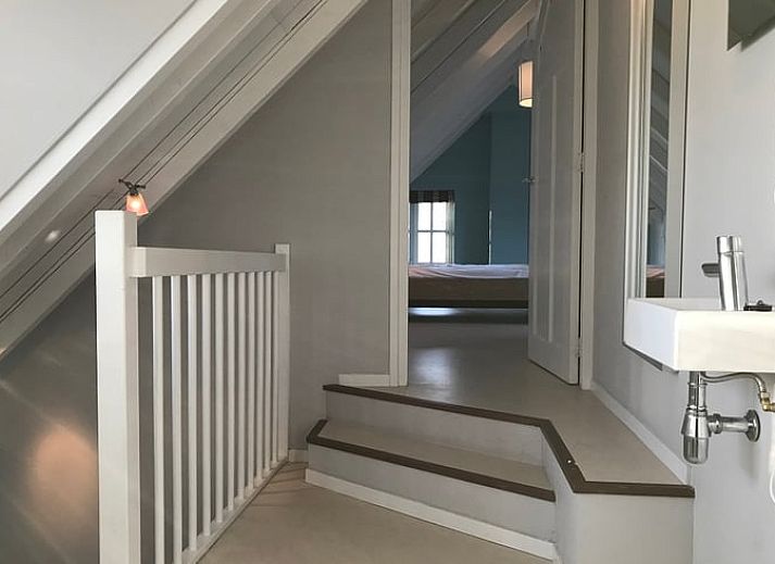 Modern kitchen in Holiday home in Kollumerpomp, Lauwersmeer, equipped with colorful furniture and spacious dining area.