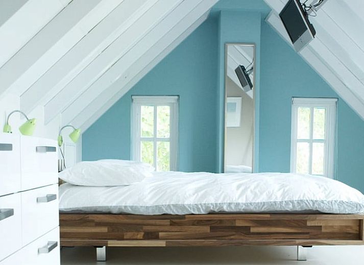 Modern kitchen in Holiday home in Kollumerpomp, Lauwersmeer, equipped with colorful furniture and spacious dining area.