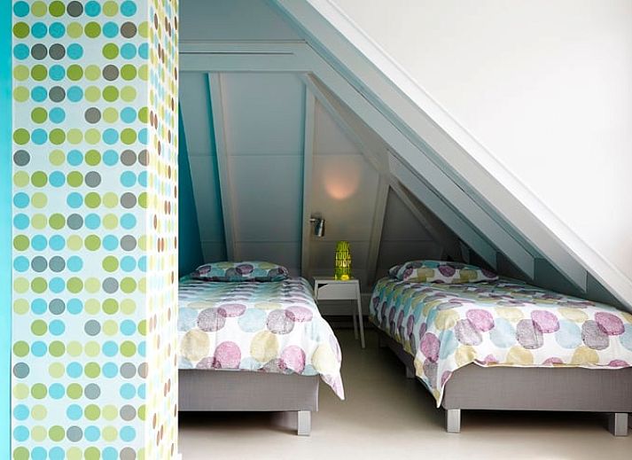 Stylish indoor space in Holiday Home in Kollumerpomp, Lauwersmeer, with comfortable sofa and cozy furnishings.