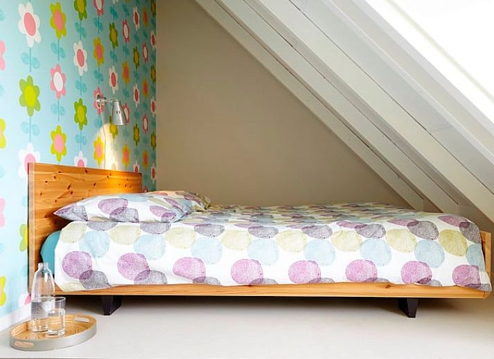 Stylish indoor space in Holiday Home in Kollumerpomp, Lauwersmeer, with comfortable sofa and cozy furnishings.