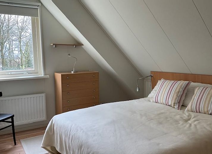 Achterzijde van Vakantiehuis in Spier met zonnig terras in het hart van Midden Drenthe.