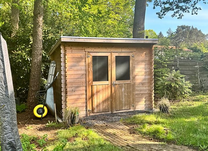 Comfortabele zithoek in Vakantiehuis in Spier, perfect voor ontspannen momenten in Drenthe.