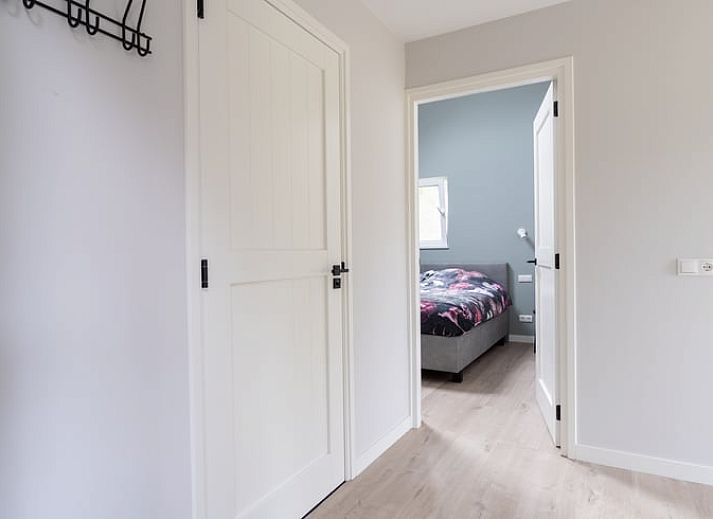 Slaapkamer in Vakantiehuisje in Spier, Drenthe met comfortabel tweepersoonsbed.