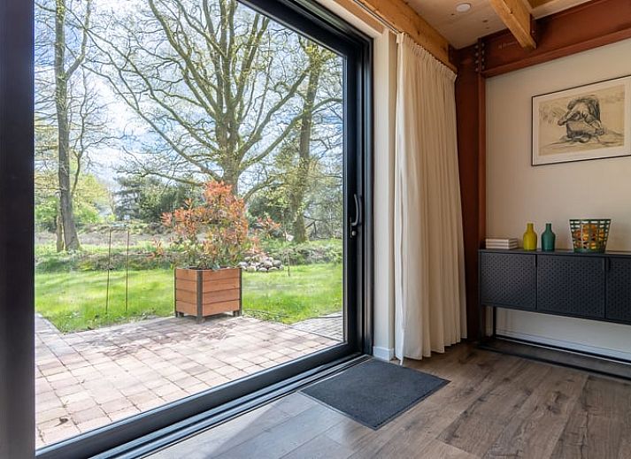 Terrace of Cottage in Spier overlooking green surroundings in Drenthe.