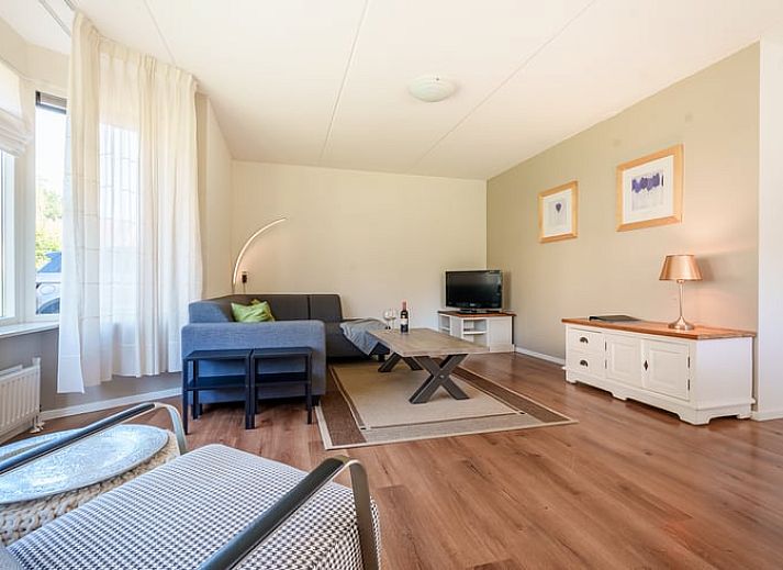 Ferienhaus in Schoonloo, Midden Drenthe, mit roten Dachziegeln und Balkon, ideal fuer einen entspannten Aufenthalt in der Natur von Drenthe.