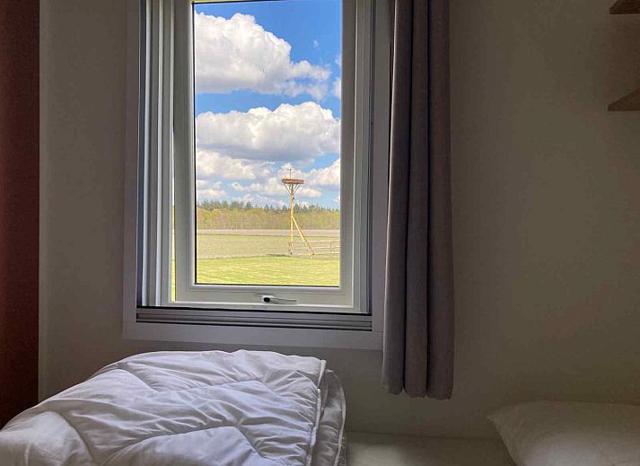 Whirlpool auf der Terrasse von DG988 Glamping Lodge in Schoonloo, Midden Drenthe.