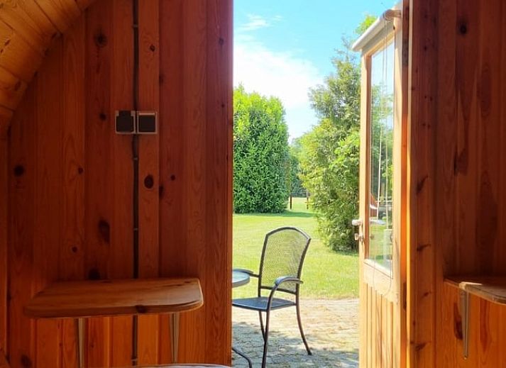 Wooden cottage in Grolloo with terrace in the nature of Middle Drenthe, Drenthe.